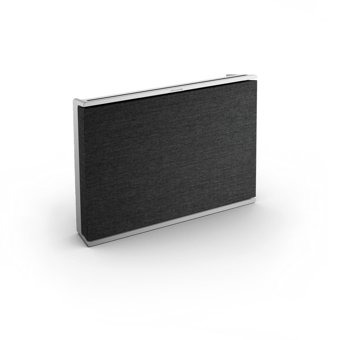 Beosound Level portable WiFi speaker in Natural with dark fabric grille and aluminum frame