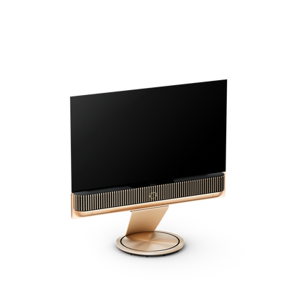 Bang & Olufsen Beovision Theatre fjernsyn med sort skærm og kobberfarvet sokkel og grill