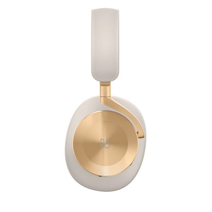 Beoplay H95 hovedtelefoner i beige læder og guld finish set fra siden