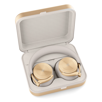 Gold Bang & Olufsen Beoplay H95 headphones in open carrying case