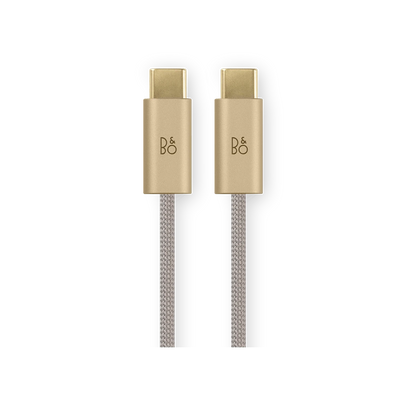 Guldfarvet USB-C til USB-C kabel med B&O logo og flettet stofledning