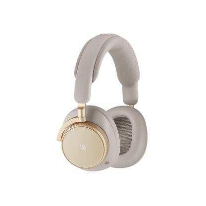 Beoplay H100 over-ear hovedtelefoner i beige med gulddetaljer på hvid baggrund