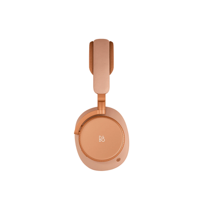 Beoplay H100 over-ear hovedtelefoner i kobberfarvet design set fra siden